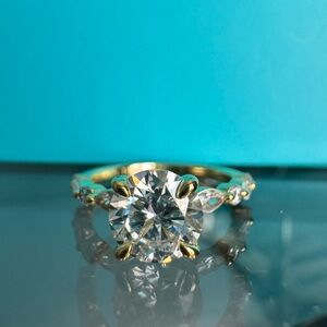 1.5 ct Moissanite marquise and round cut ring